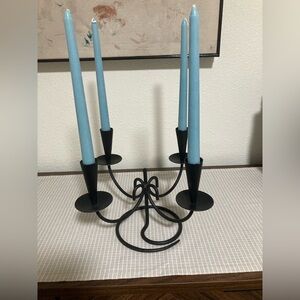 black faux wrought iron candelabra four light blue taper candles tabletop decor